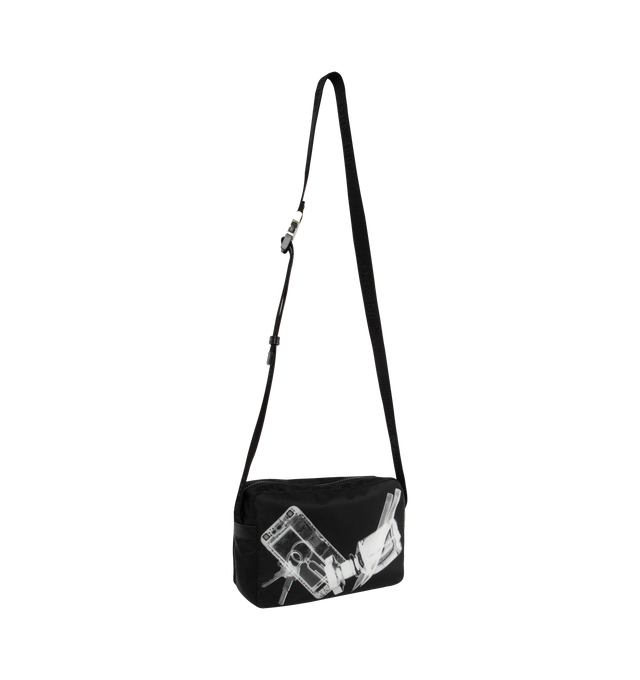 Image 2 of 3 - BLACK - OFF-WHITE X-Ray Camera Bag featuring  X-Ray print, adjustable logo-jacquard shoulder strap, logo print to the front, front zip-fastening pocket with branded zip puller, main compartment, internal card slot with logo print, full lining, silver-tone hardware and top zip fastening. 100% recycled polyamide. 