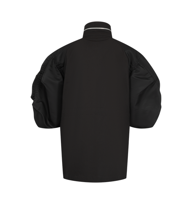Image 2 of 4 - BLACK - Sacai oversized jacket in cotton weather cloth featuring nylon twill sleeve panels, high stand collar with zipper detail, concealed front closure, flap pockets at the chest and waist, and a sleeve zip pocket. Outer fabric is 100% cotton with 100% nylon sleeves and 100% polyester lining and fill. Made in Japan. 