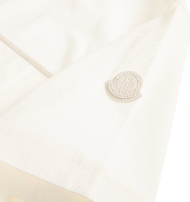 Image 2 of 2 - NEUTRAL - MONCLER Cotton Piquet Polo Shirt featuring stretch cotton blend piquet, collar, short sleeves, snap button closure, pocket with Alcantara detail and double leather logo patch. 96% cotton, 4% elastane/spandex. Made in Turkey. 