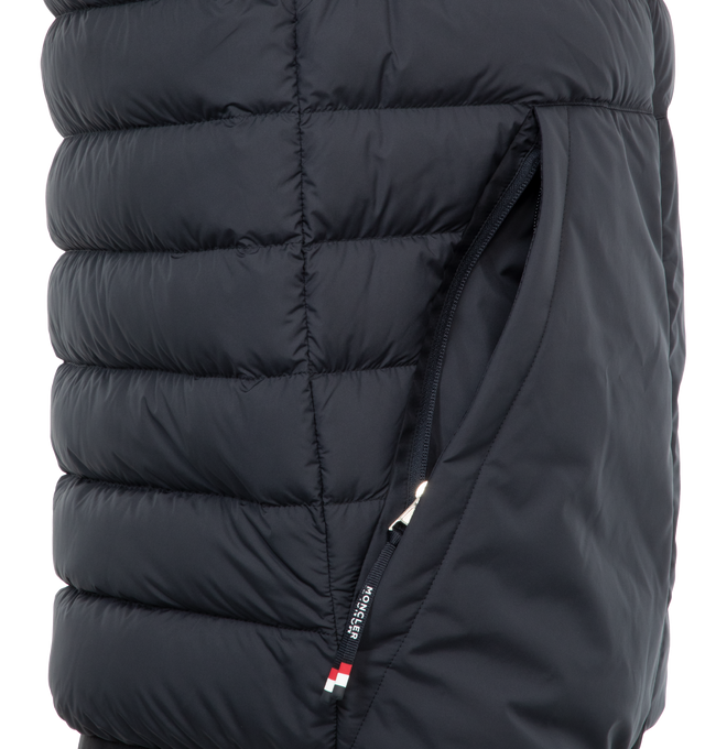 NAVY - MONCLER Rabuons Vest featuring goose down, padded design, appliqu logo, high neck, sleeveless, two side zip-fastening pockets, straight hem, full lining and front two-way zip fastening. 100% polyester. Lining: 90% goose down, 10% feather down. 