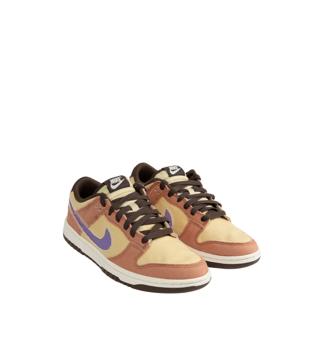 Image 2 of 5 - NEUTRAL - Nike Dunk Low Sneakers with Dusted Clay, Dusty Amethyst and Team Gold color-blocking,  a padded, low-cut collar, leather upper with a slight sheen and durability, foam midsole offering lightweight, responsive cushioning. Perforations on the toe add breathability. Rubber sole with classic hoops pivot circle provides durability and traction. 