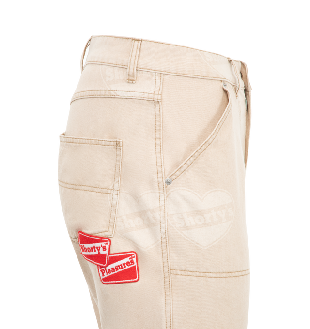 Image 3 of 3 - BROWN - Pleasures Heart Ultra Work Pants have a zip fly with a button closure, front slant pockets, back patch pockets, and all-over printed artwork. 100% cotton.  