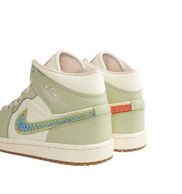 Image 3 of 5 - GREEN - JORDAN Air Jordan 1 Mid SE Sneaker featuring knitted textiles and crocheted charm, leather in the upper, encapsulated Nike Air-Sole unit, rubber in the outsole and mid-cut collar. 