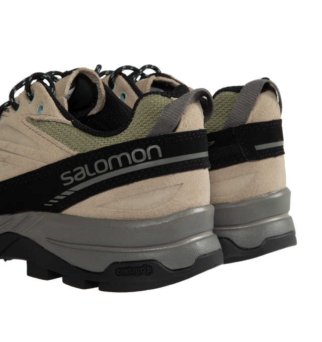 Image 3 of 5 - BROWN - SALOMON X-Alp Leather Sneakers featuring low-top, paneled suede and canvas, rubber cap toe, lace-up closure, reflective logo at padded tongue and outer side, padded collar, pull-loop at heel tab, mesh lining, 3D Edging Chassis system at foam rubber midsole and Treaded Contagrip rubber sole. Upper: leather, textile. Sole: rubber. Made in Viet Nam. 