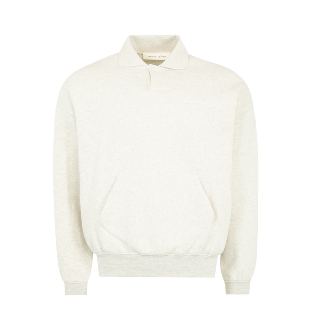 Image 1 of 2 - WHITE - FEAR OF GOD ESSENTIALS Signature 3/4 Sleeve 90s Polo featuring 380GSM core fleece, 90's relaxed silhouette, embroidered Essentials signature on the front, covered Henley placket, kangaroo pocket, rib-knit polo collar, cuffs and waist-hem and Essentials signature label is at the back collar. 80% cotton, 20% polyester. 