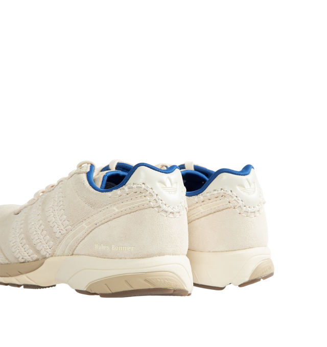 Image 3 of 5 - CREAM - Adidas Originals x Wales Bonner Men's Adizero Adios Suede Shoes blend classic adidas running heritage with Wales Bonner's elevated design perspective. Crafted with a premium leather upper, this refined interpretation of the iconic Adizero Adios silhouette delivers everyday comfort while balancing vintage sport influences with contemporary style. A textile lining enhances comfort, while the durable rubber outsole provides reliable traction for daily wear. Main Material: Leather Upper.  