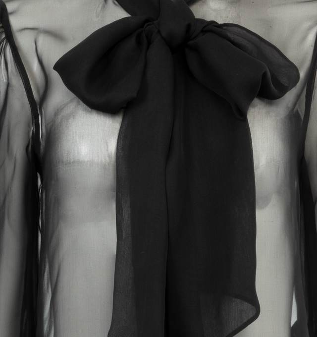 Image 3 of 3 - BLACK - Saint Laurent Bow Neck Chiffon Blouse is a pullover style with a round neckline, bow, and button cuffs. 100% silk. Made in Italy.  