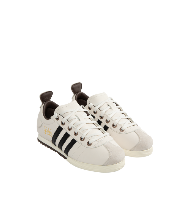 Image 2 of 5 - WHITE - Adidas Samba 62 Sneakers are a low-top, lace-up style with leather uppers, suede toe overlays, signature branding on the tongue labels, and gum rubber outsoles. Unisex style in men's sizes. 