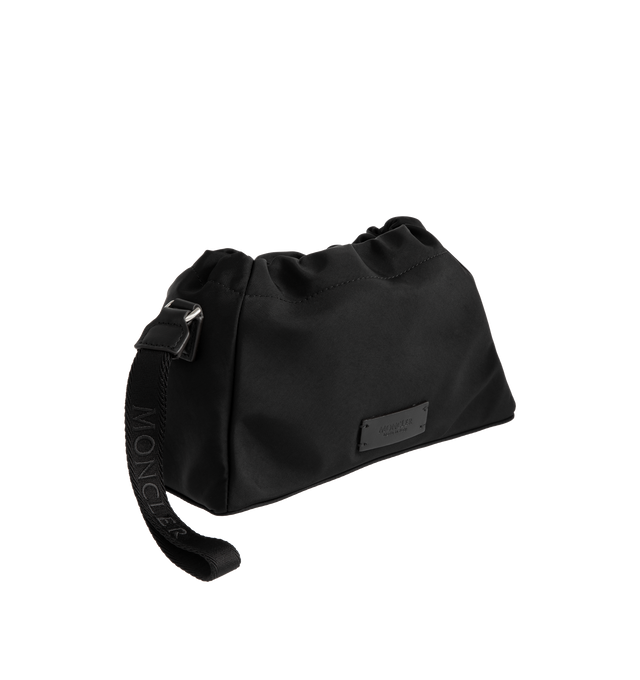 Image 2 of 3 - BLACK - MONCLER Trick Water-Repellent Pouch featuring nylon drill, recycled water-repellent nylon lining, drawstring fastening, detachable wristlet with carabiner and embroidered logo. L 30 cm x H 20 cm x D 13 cm. 52% polyamide/nylon, 48% polyester. Made in Italy. 