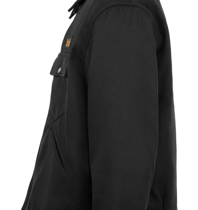 Image 3 of 3 - BLACK - Needles Men's Railroad Zip Jacket is crafted from double-cloth polyester and features a front zip closure, a buttoned flap chest pocket, and welt pockets at the sides. Designed with a relaxed silhouette for easy layering, this new style combines a workwear-inspired aesthetic with a refined melange finish and substantial textured construction for added warmth and structure. Main Material: 100% Polyester. Made in Japan. 