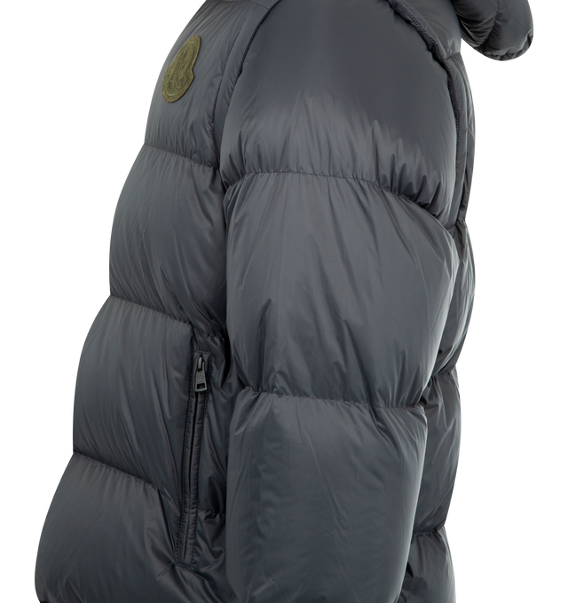 Image 4 of 5 - BLACK - MONCLER Cyclone 2-in-1 Hooded Short Down Jacket featuring recycled nylon, nylon laqu lining, down-filled, detachable hood and sleeves, zipper and snap button closure, zipped pockets, elastic cuffs and hem with elastic drawstring fastening. 100% polyamide/nylon. Padding: 90% down, 10% feather. Made in Italy. 
