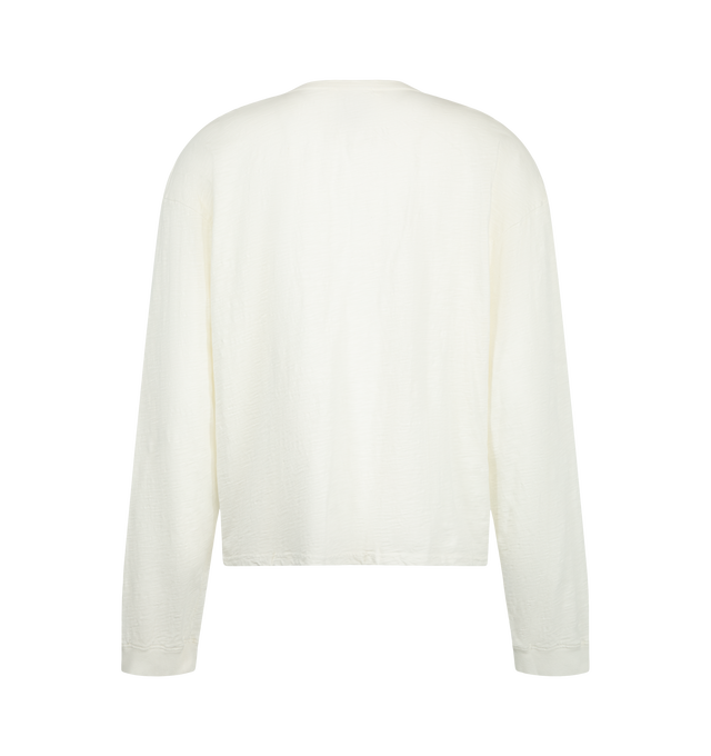 Image 2 of 2 - WHITE - Rhude Men's Helmethead Rallye Long Sleeve T-Shirt is crafted from cotton and features a vintage-inspired motorsport graphic at the front, signature Rhude logo detailing, and a relaxed silhouette with dropped shoulders. Designed with a classic crew neckline, long sleeves, and a boxy fit, this graphic style channels retro racing aesthetics through the brand's contemporary streetwear lens. Main Material: Cotton.  