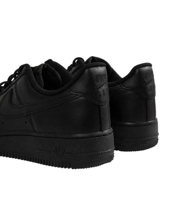 Image 3 of 5 - BLACK - NIKE Air Force 1 '07 featuring leather upper with perforated toe box, Nike Air cushioning, rubber outsole with heritage hoops pivot circles, padded collar and foam midsole. 