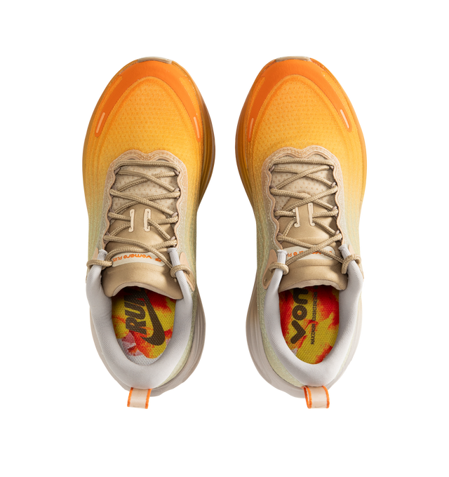 Image 5 of 5 - ORANGE - Nike Men's Vomero Plus Cheat Day SP Sneakers are crafted with engineered mesh uppers and feature a max-cushion performance silhouette inspired by the indulgent spirit of a "Cheat Day." Designed with a vibrant orange-dusted upper balanced by neutral tones, this special-edition style combines dual Air Zoom units with responsive ZoomX cushioning for exceptional comfort and energy return. Finished with a durable rubber outsole, lace-up closure, and signature Nike branding throughout. M 
