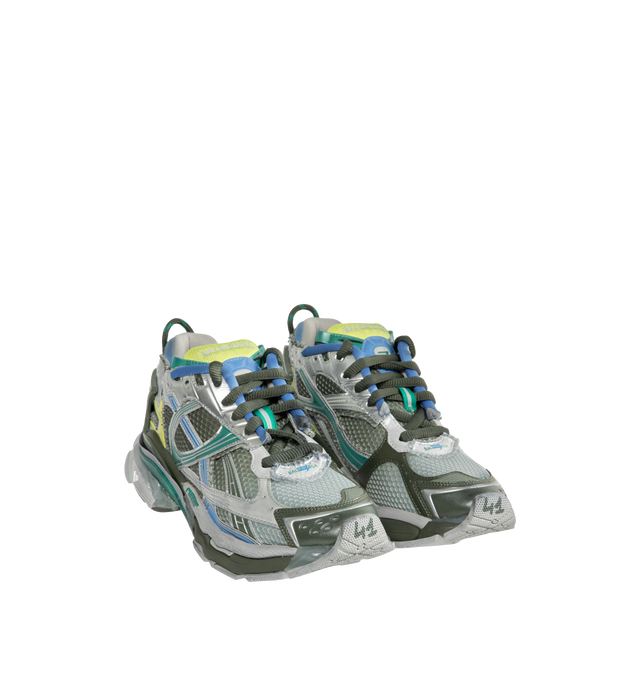 Image 2 of 5 - BLUE - Balenciaga Men's Gradient Runner Sneakers are crafted from polyurethane and polyester and feature a sportswear-inspired silhouette with a deliberately worn-in finish. Designed with printed sizing at the edge of the toe, embossed sizing at the heel, a Runner logo at the exterior, Balenciaga logo embroidery at the tongue, and logo detailing at the back of the heel, this statement sneaker blends performance-inspired design with the house's signature distressed aesthetic. Main Material: Po 