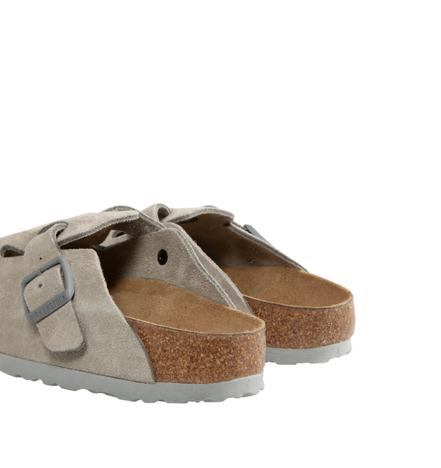 Image 2 of 4 - GREY - BIRKENSTOCK Boston Suede Slides featuring narrow width, contoured footbed for legendary BIRKENSTOCK support, classic suede upper, printed microfiber footbed lining, EVA sole is flexible & lightweight and adjustable strap with metal pin buckle. Upper material: suede. Insole: natural leather. Footbed material: cork. Outsole: EVA. Made in Germany. 