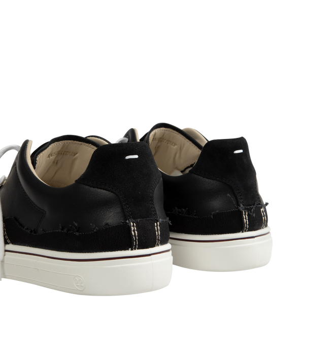 Image 3 of 5 - BLACK - Maison Margiela New Evolution Sneakers are a lace-up style with calfskin, suede, and canvas details, chunky rubber soles, a logo label tag, and contrast stitching. Made in Italy.  