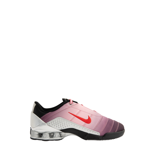 Image 1 of 5 - PINK - Nike Womens Shox Magia Sneakers feature a premium leather and textile upper. Designed with a lace-up closure, metallic accents, Nike Shox cushioning columns, and durable rubber outsole. Upper: Leather and Textile; Cushioning: Nike Shox; Outsole: Rubber. Imported 