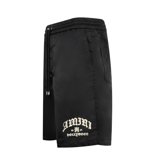 Image 3 of 4 - BLACK - AMIRI Hollywood Drawstring Woven Shorts featuring regular fit, high-rise, drawstring elasticated waistband, two slip pockets, brand embroidery at front, two patch pockets and brand patch at back. 100% polyamide. Made in Italy. 