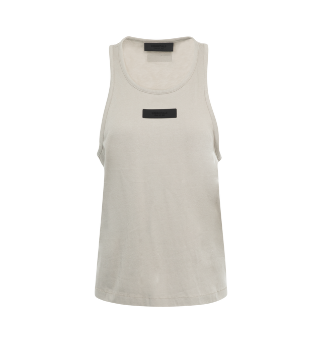 Image 1 of 2 - GREY - FEAR OF GOD ESSENTIALS Tank Top featuring a U-neckline, fixed straps, a relaxed body with dropped armholes, and minimalistic rubber brand labels at the upper back and chest. 53% cotton, 40% polyester, 7% rayon.