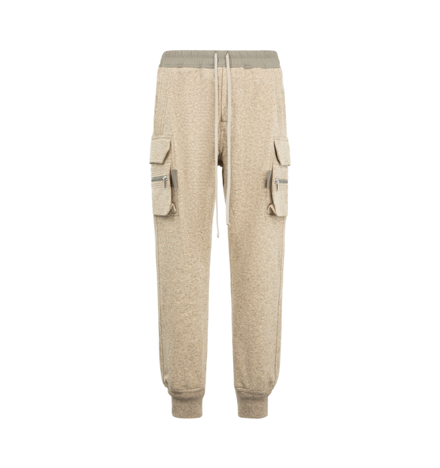 Image 1 of 3 - NEUTRAL - Rick Owens Men's Mastodon Cargo Pants are crafted from a wool and cotton blend and feature a slim cargo silhouette with an elasticized drawstring waistband. Designed with a concealed fly and button closure, the style is finished with cargo pockets on both sides for a utilitarian look. Main Material: 65% wool, 35% cotton. 