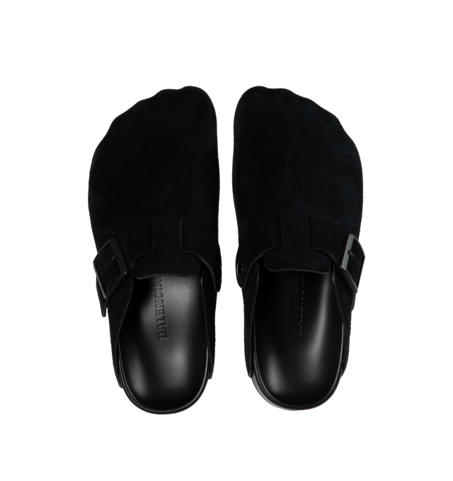 BLACK - BALENCIAGA Sunday Mule featuring suede calfskin, mule, five finger shape at toe, one leather strap with one adjustable belt buckle, Balenciaga logo engraved on buckle, printed Balenciaga logo on sole part and tone-on-tone sole and insole. 100% calfskin. Made in Italy.