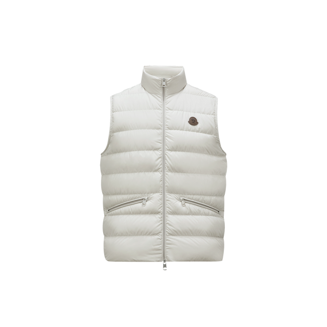 Image 2 of 3 - WHITE - MONCLER Treompan Down Vest featuring lightweight micro chic lining, down-filled, collar with snap button closure, zipper closure, zipped pockets and leather logo. 100% polyester. Padding: 90% down, 10% feather. 