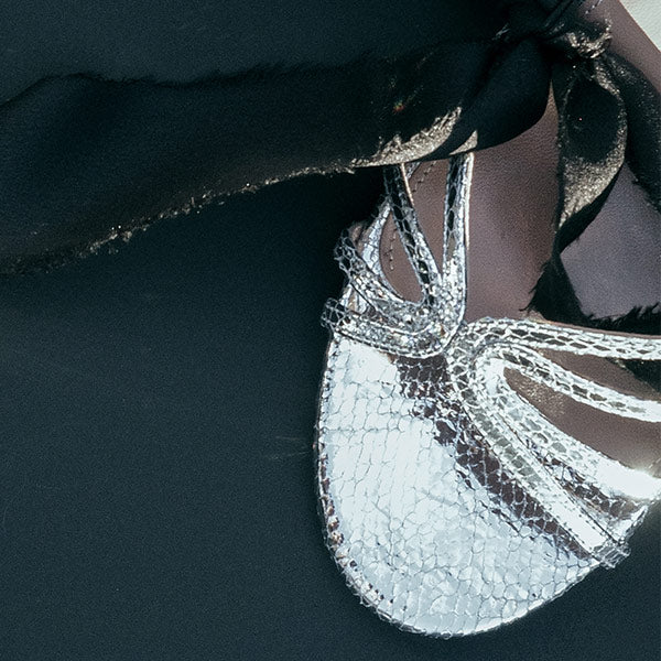 Silver high-heeled shoe by Aquazzura