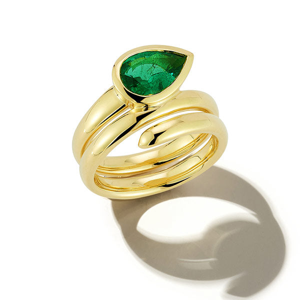 Gold ring with a green gemstone by Jemma Wynne