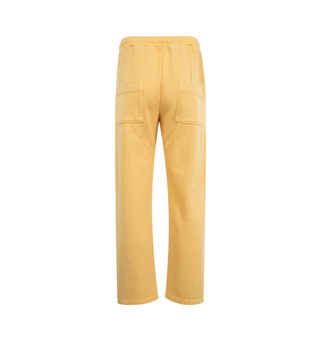 Image 2 of 3 - YELLOW - BARRIERS Cowrie Shell Sweatpants featuring heavyweight french terry, distressed garment dye, straight leg, diagonal side seam stitch, drawstring waistband, logo print at front, star in crackle distressed print and cowrie shells in puff print. 100% cotton. Made in USA. 