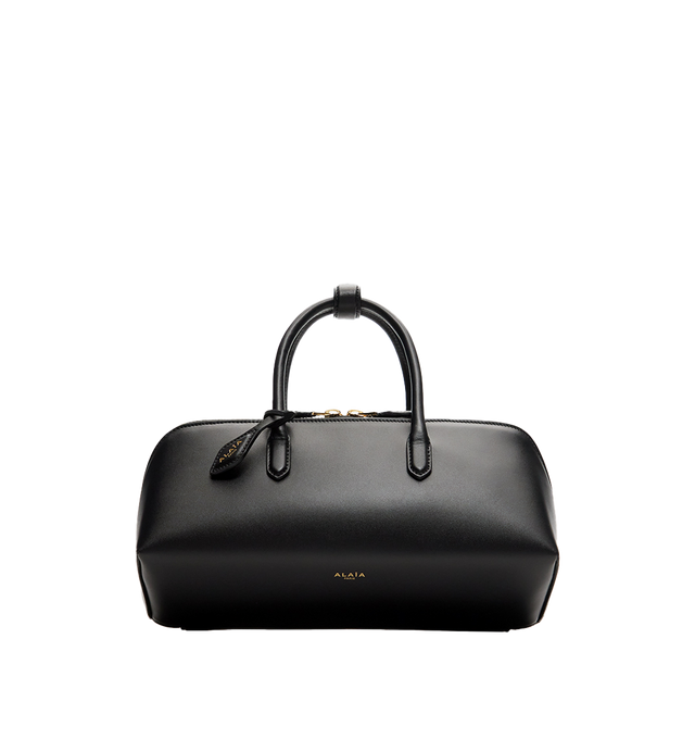 Image 1 of 2 - BLACK - Alaa Women's Delta Small Bag In Box Calfskin features a sculptural sihlouette crafted from soft box calfskin leather and features an elongated silhouette with clean square lines, top handles, a double zip closure, and a front gusset compartment for organized storage. Finished with a decorative branded tie and designed for hand carry. Main Material: 100% Calf Leather. Dimensions: 28 x 11 x 10 cm. Fits a large phone, card case, keys, sunglasses and other small essentials. Made in Italy. 