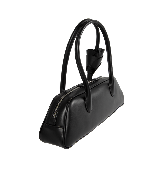 Image 2 of 3 - BLACK - MAGDA BUTRYM Brigitte bag in a trapeze shape. Inspired by the nostalgia of 90's with an elegant silhouette, roomy interior, two top handles, top zipper and leather flower embellishment  fixed onto the bag's handle.  Made in Italy. 100% Calf Leather exterior and interior. 