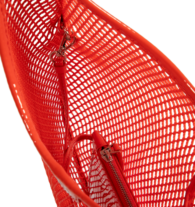 Image 3 of 3 - ORANGE - Alaia Medium hobo shoulder bag crafted from polyamide fishnet with calf leather time, lined with cotton and lambskin. Features a detachable inner pocket in patent leather and a leather knot closure.  Measures 26cm x 39cm. Made in Italy. 
