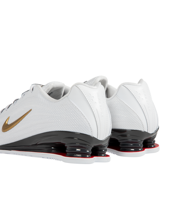 Image 3 of 5 - WHITE - NIKE Shox Z Sneaker featuring a slim, low-profile shape, textile upper, synthetic leather accents, Nike Shox columns, circular Waffle outsole, foam midsole and rubber outsole. 