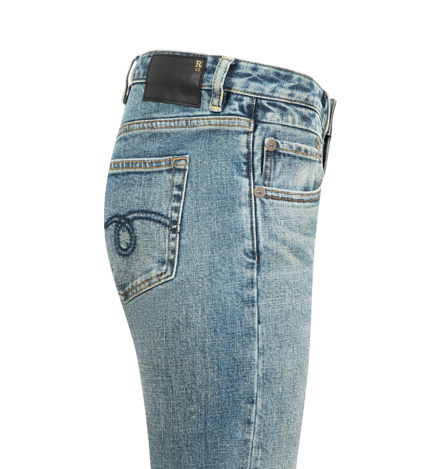 Image 3 of 3 - BLUE - R13 Boy Flare Jeans featuring stretch denim, fading, whiskering, and distressing throughout, flared leg, belt loops, five-pocket styling, zip fly, leather logo patch at back waistband, logo-engraved antiqued copper-tone hardware and contrast stitching in yellow. 98% cotton, 2% elastane. Made in Italy. 