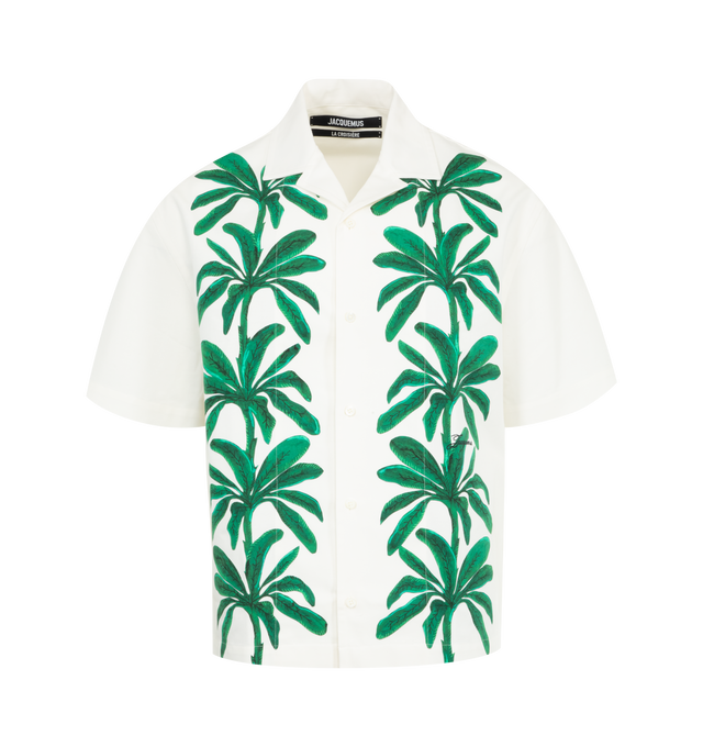 Image 1 of 2 - WHITE - JACQUEMUS Painted Palm Trees Printed Shirt featuring oversized fit, painted Palm Tree printed thick cotton, camp collar, short elbow-length sleeves, 50s embroidered logo, back yoke with J locker loop and mother-of-pearl buttons. 100% cotton. Made in Portugal. 