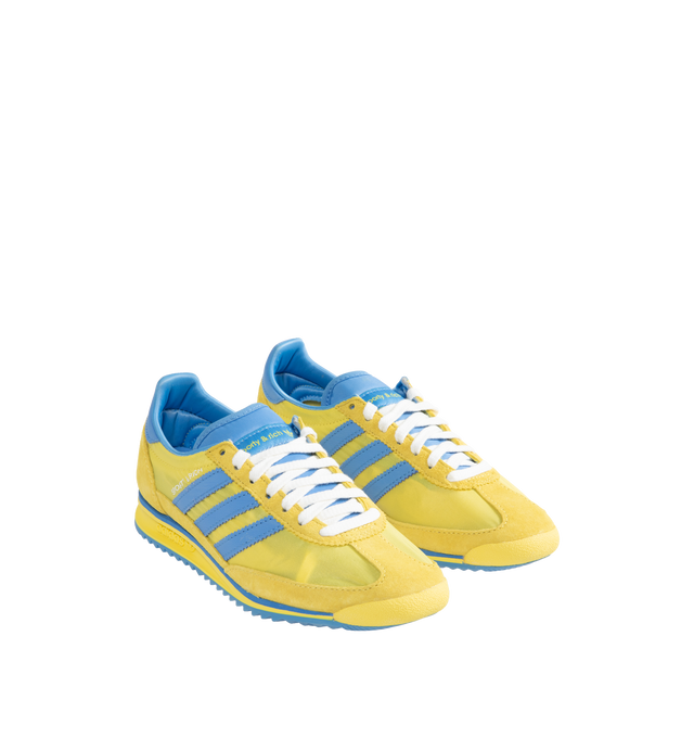 Image 2 of 5 - YELLOW - Adidas x Sporty & Rich SL 72 sneakers in bright yellow and blue colors inspired by Swedens national flag. Featuring retro elements and clean and minimalist style with adidas logo and Sporty & Rich branding. Unisex style in men's sizing. 