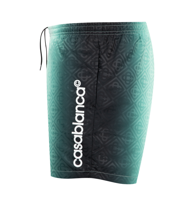 Image 3 of 3 - GREEN - CASABLANCA Gradient Monogram Jacquard Swim Shorts featuring signature Casablanca logo down the side, elasticated waistband, internal drawstring fastening, a lining, an internal pocket, and in-seam side pockets. 100% polyester. 