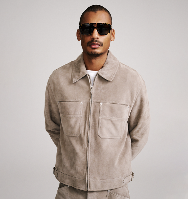 Image 3 of 4 - NEUTRAL - Bottega Veneta Men's Full-Grain Suede Jacket is crafted from supple full-grain suede and features a front zip closure, an unlined interior, and a regular-fit silhouette. This designer suede jacket combines minimalist Italian craftsmanship with a timeless silhouette for elevated everyday layering. Main Material: Full-Grain Suede Leather. Made in Italy. his item may be restricted for online purchase to international clients. For assistance purchasing this item please contact our dedic 