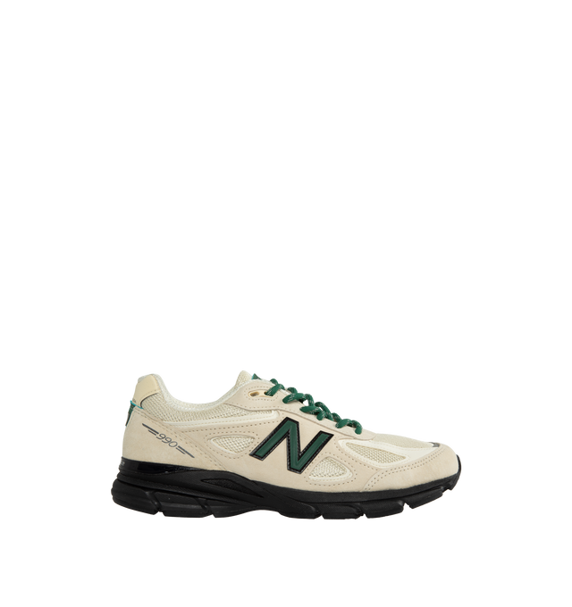 WHITE - NEW BALANCE 990 sneaker in "Macadamia Nut" colorway crafted from premium materials, light beige mesh uppers, cream suede, accented with pops of green and black throughout. The signature 990 branding marks the heels and sidewalls, while the iconic ENCAP midsole and foam cushioning provide unparalleled comfort underfoot. Featuring mesh uppers, suede overlays, rubber outsole. Made in the USA.