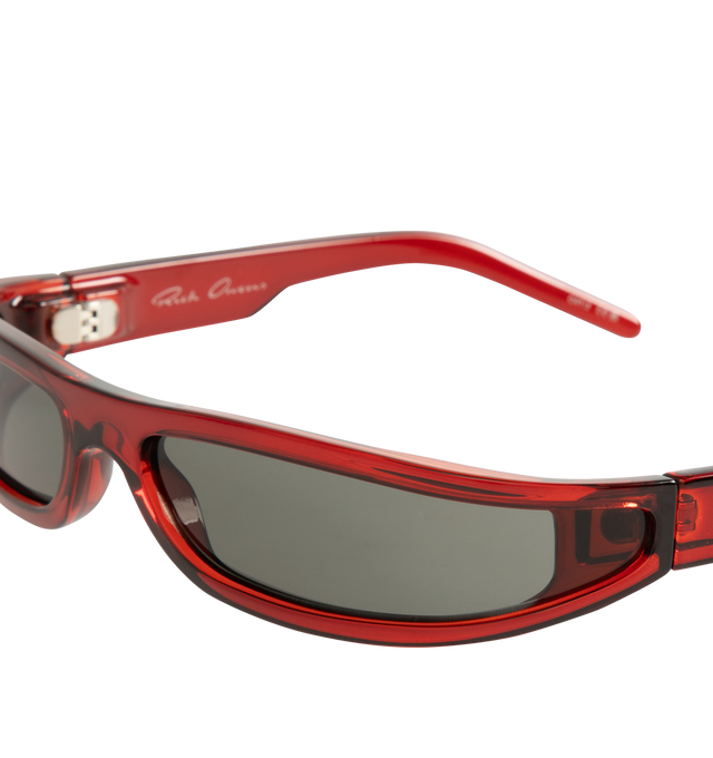 Image 3 of 3 - RED - Rick Owens Mens Rectangular Sunglasses feature a lightweight Rilsan nylon frame with red lenses. Designed with integrated nose pads, 100% UVA/UVB protection (Category 3), and include a leather storage pouch. Frame Material: Rilsan Nylon. Made in Italy. 