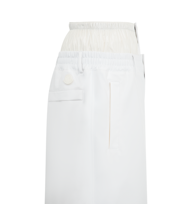 Image 3 of 3 - WHITE - Moncler x A$AP Rocky Logo Print Shorts featuring 3L 4-way stretch polyester, waistband with gaiter, snap button and zipper closure, pockets with snap button closure, logo print and logo patch. 78% polyester, 12% elastane/spandex, 10% polyamide/nylon. Padding: 100% polyester. 