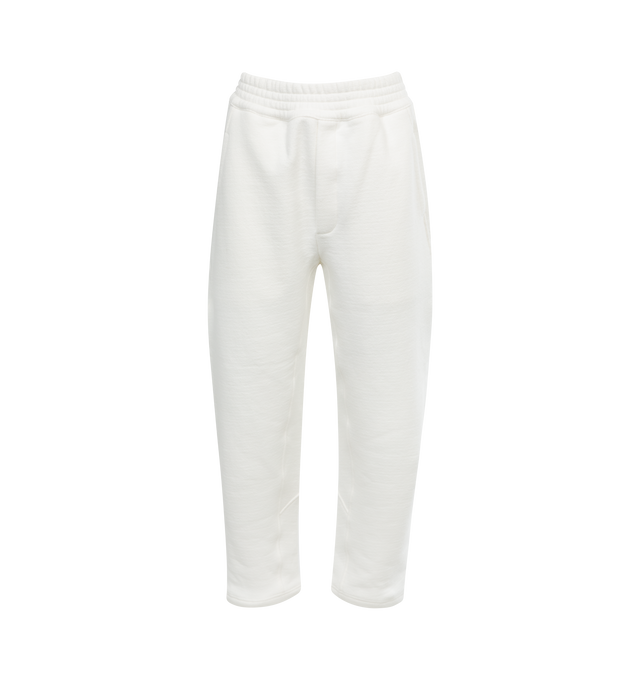 Image 1 of 3 - WHITE - THE ROW Koa Pant featuring low-waist, heavy French terry with tapered leg, elasticated waistband and washed finish for a worn-in feel. 97% cotton, 3% elastane. Made in Italy. 