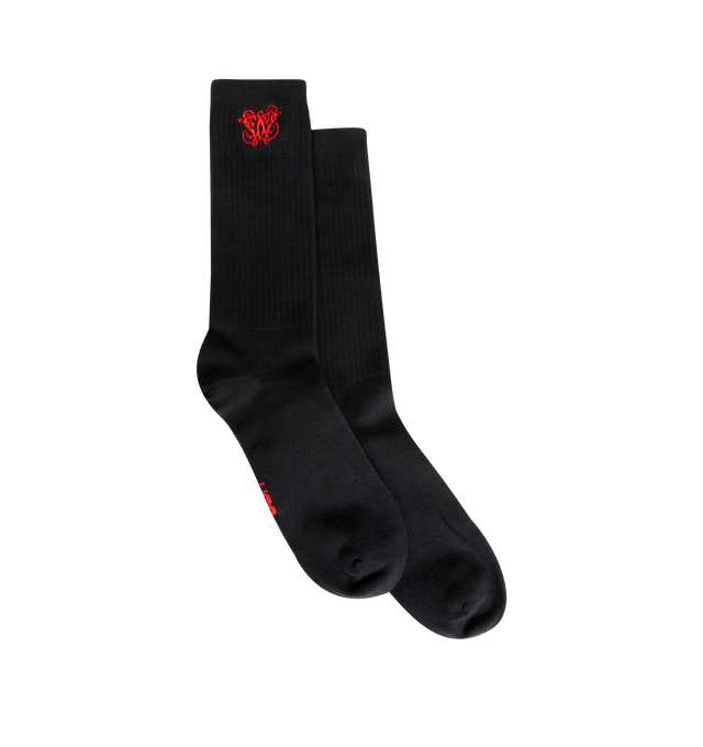 Image 1 of 2 - BLACK - UGG x Willy Chavarria Sock is crafted in 100% cotton with red graphic embroidery complementing the aesthetics of the unisex UGG x Willy Chavarria footwear line and apparel. 