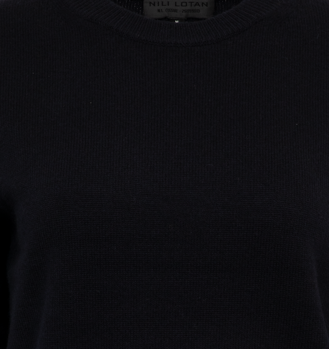 Image 3 of 3 - NAVY - NILI LOTAN NORA SWEATER featuring Light to medium weight, straight fit, set in sleeve, double layer rib neck cuff, fully fashioned along sleeve, body, and shoulder, wristlet sleeve length and signature center back cableknit detail. 100% cashmere.  