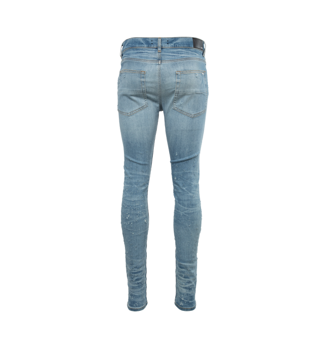 Image 2 of 4 - BLUE - AMIRI Crystal Shotgun Jeans featuring belt loops, five-pocket styling, button-fly, leather logo patch at back waistband and logo-engraved silver-tone hardware. 92% cotton, 6% elastomultiester, 2% elastane. Made in USA. 