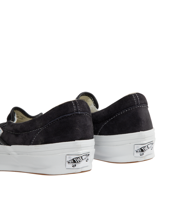 Image 3 of 5 - BLACK - VANS LX Classic Slip-On 98 Sneakers featuring canvas slip-on sneakers, elasticized gussets at vamp, padded collar, logo flag at outer side, rubber logo patch at heel, grained leather and canvas lining, textured rubber midsole, treaded rubber sole and contrast stitching in white. Upper: textile. Sole: rubber. Made in Philippines. 