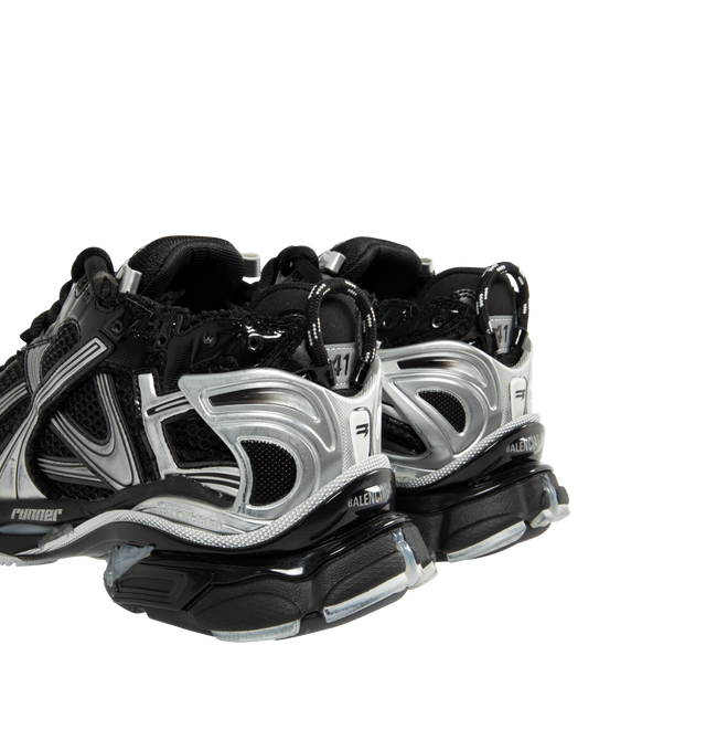 Image 3 of 5 - BLACK - BALENCIAGA Runner Sneakers featuring lace-up closure, pull-loop at heel collar, logo rubberized at heel tab, textured foam rubber midsole and treated rubber outsole. Upper: textile, synthetic, rubber. Sole: rubber. Made in China. 
