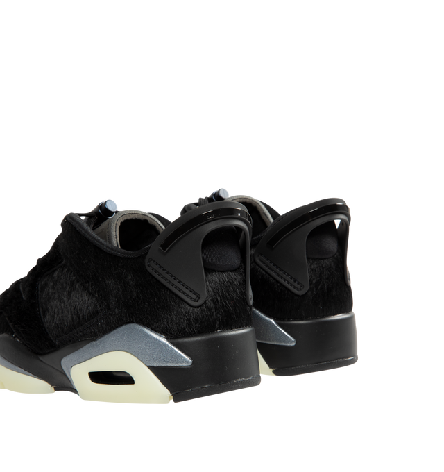 Image 3 of 5 - BLACK - JORDAN Air Jordan 6 Low Sneaker featuring leather and textile upper with pony hair and rubber sole, lace-up closure, padded low-cut collar, triple-black palette, translucent outsole and rounded toe. 