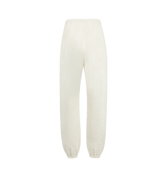 Image 2 of 3 - WHITE - FEAR OF GOD ESSENTIALS Classic Sweatpant featuring 480gsm core fleece, relaxed silhouette that tapers into an elastic hem, encased elastic waistband with elongated drawcords, side seam pockets and a Fear of God Essentials label stitched at the center front. 80% cotton, 20% polyester. 